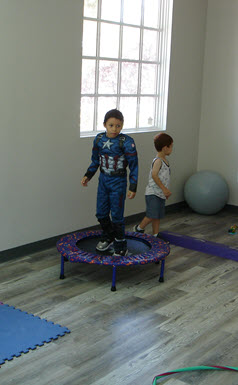 Child on trampoline in the Fun Zone